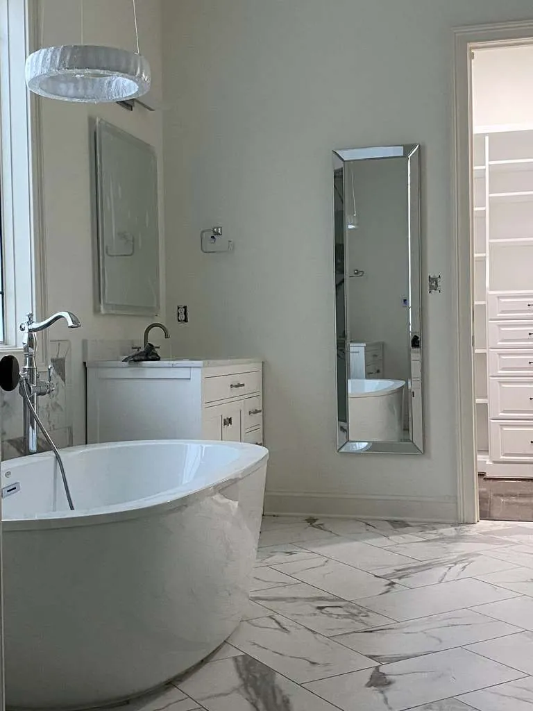 Remodeled bathroom with freestanding tub